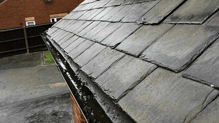 Clean gutters protecting a home and yo prevent damage to the property 