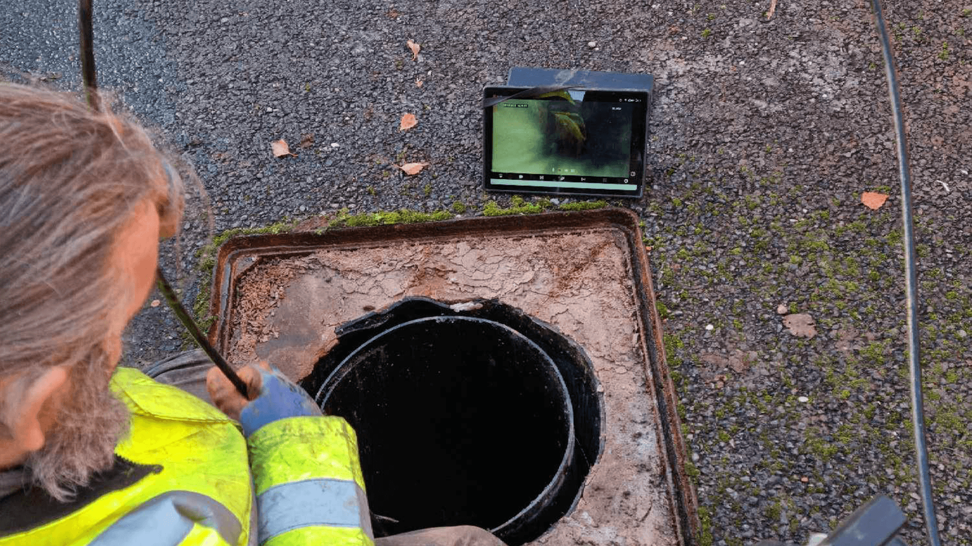 A Budget drains nottingham drainage engineer performing a CCTV Drainage survey