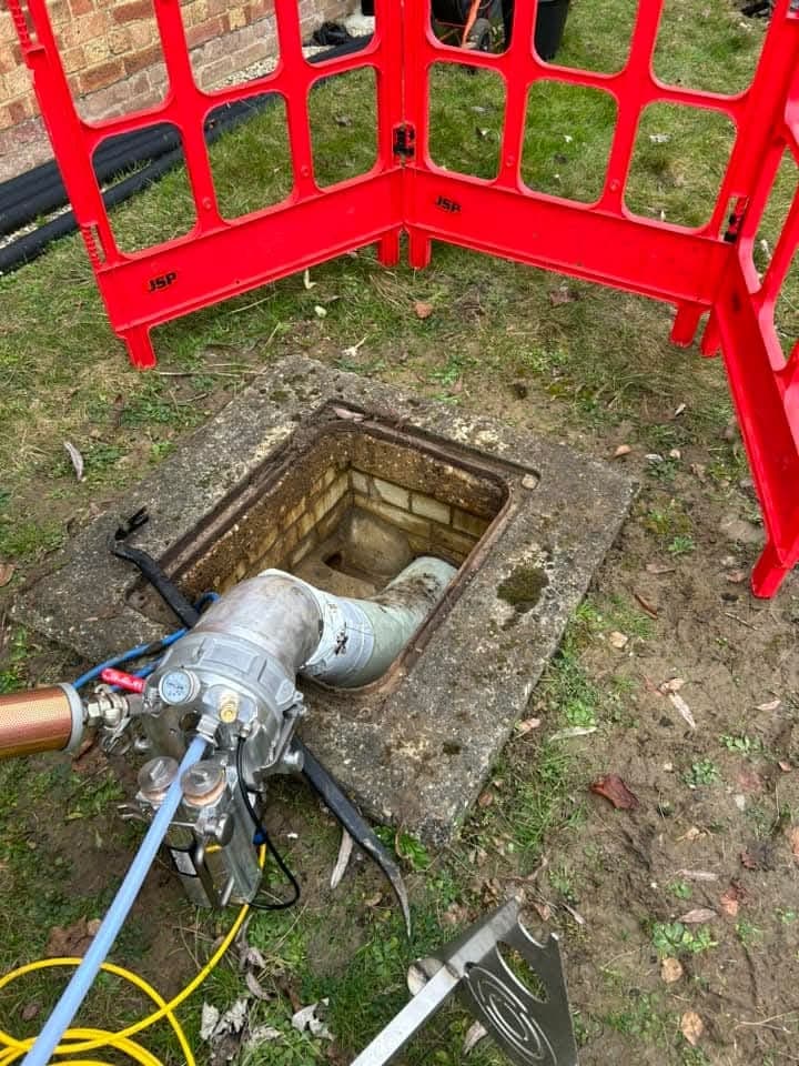 Professional drain relining equipment in action